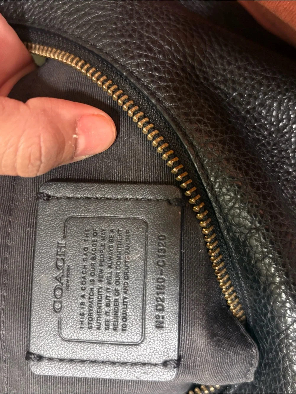Coach Black Pebbled Leather Shoulder Bag with Red Flower Charm